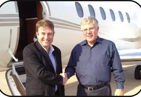 Buyer and broker at the cabin door