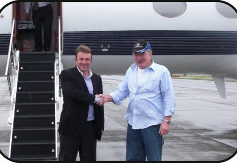 A delivery handshake on the airstair